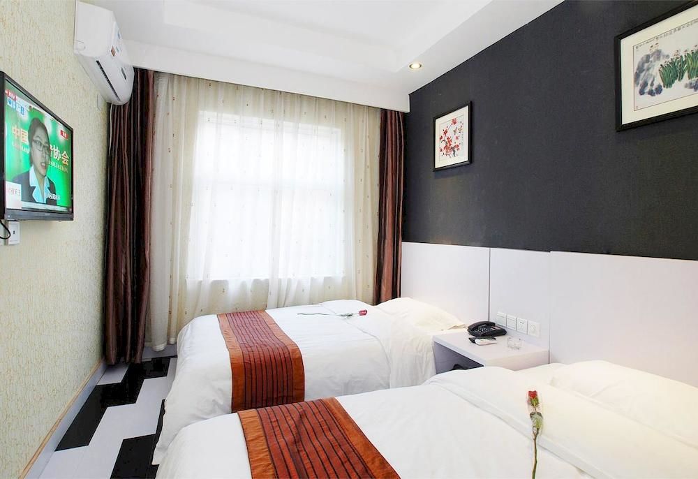 Xi'An Hometown Runtu Business Hotel Bagian luar foto